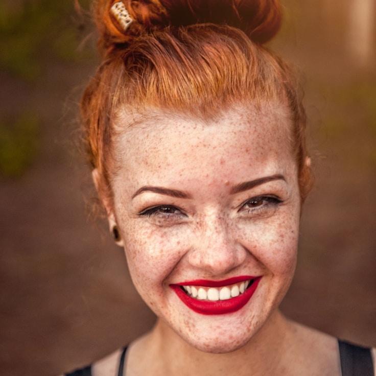 Kaveri Mehta, Lead Design Curator at BrownStreamPivot, reviewing corporate floral arrangements